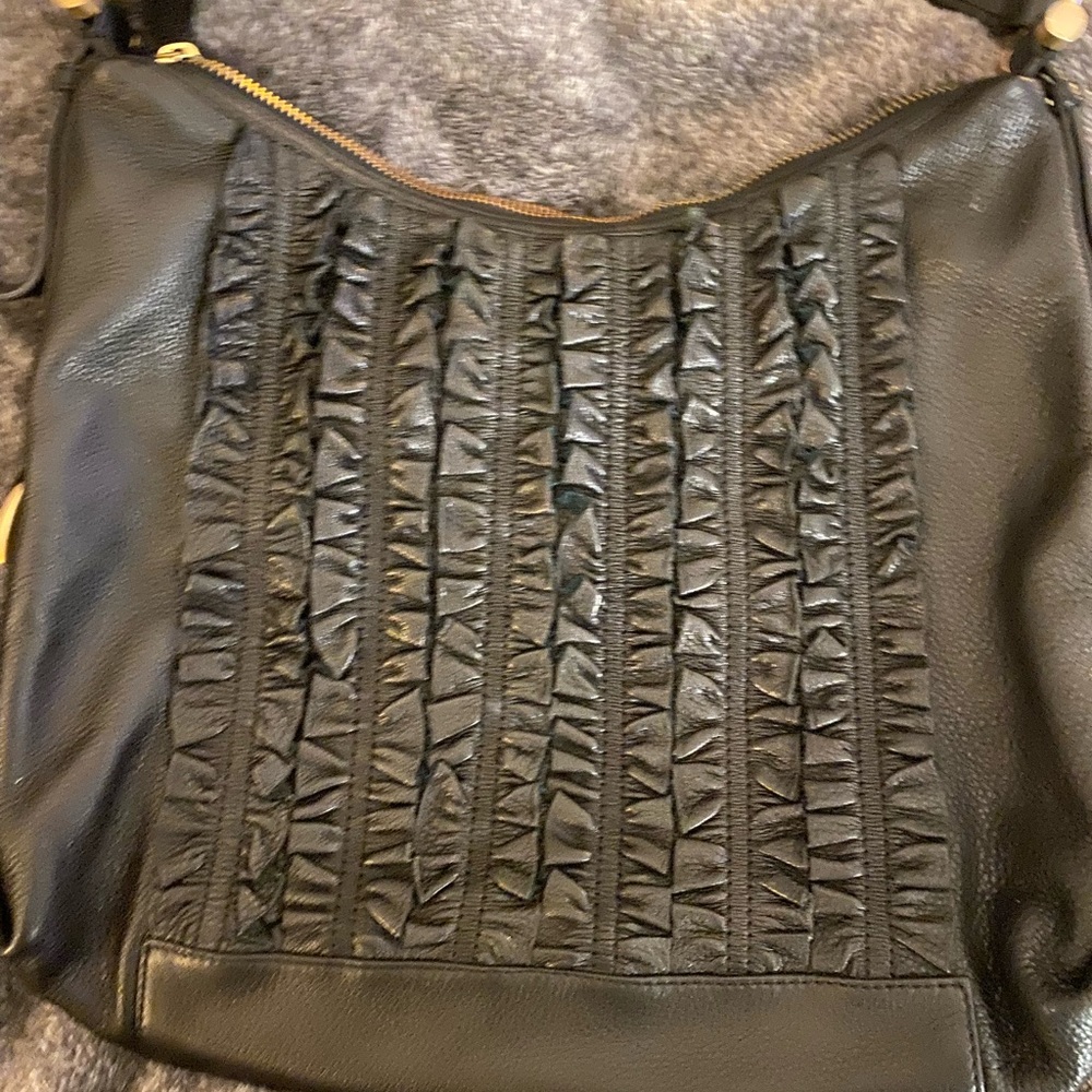Black leather Tahari shoulder bag.